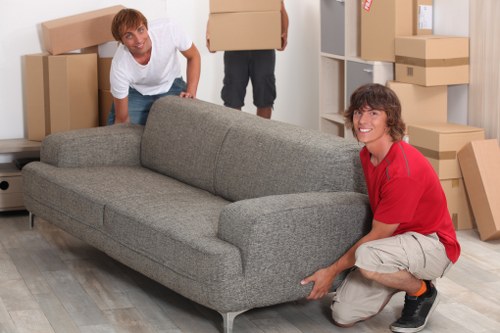 Professional movers loading boxes for a Northwood office relocation